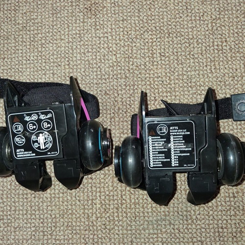 Razor Jetts Heel Wheels used, adjustable size, black with blue and pink details
