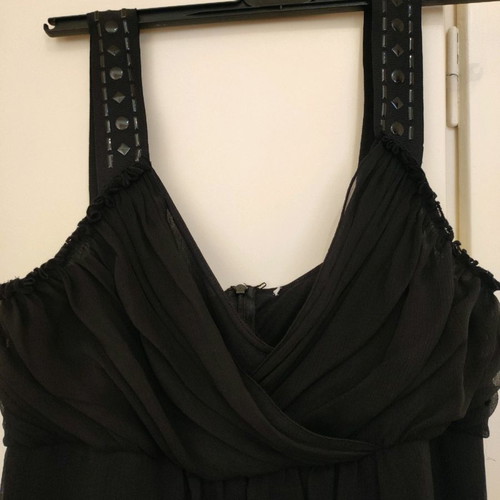 Black blouse with fringes used and black evening dress