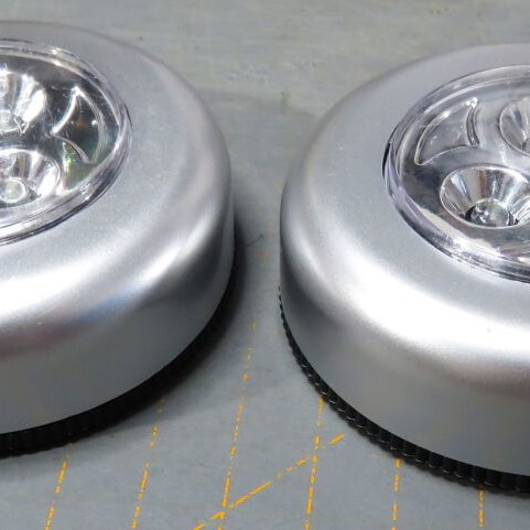 Set of 2 used LED push lights for closets with battery power