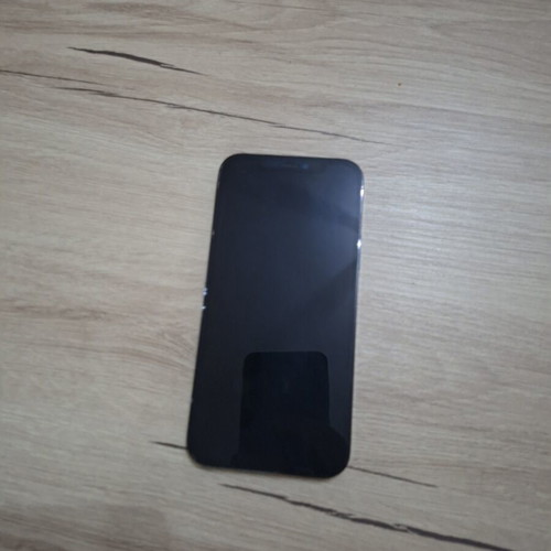 iPhone 12 Pro smartphone with 80% battery health, case included