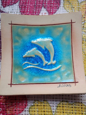 Handmade decorative plate with dolphins