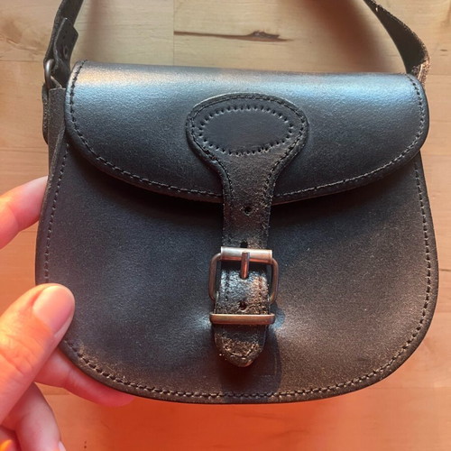 Black leather crossbody bag used