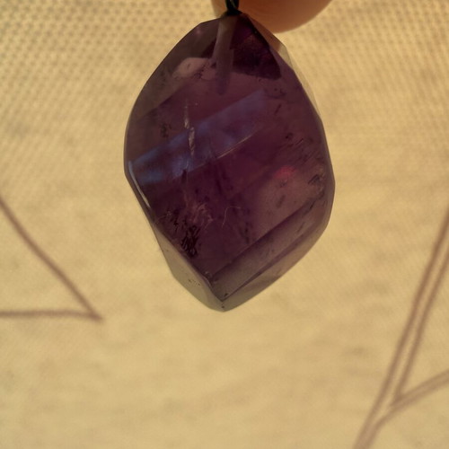 Amethyst pendant with silver bail