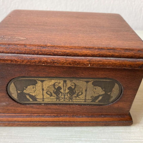 Wooden jewelry box with brass details used