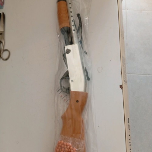 Toy shotgun new with plastic pellets