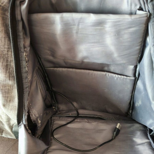 NOD anti-theft backpack used, gray with laptop compartment and USB