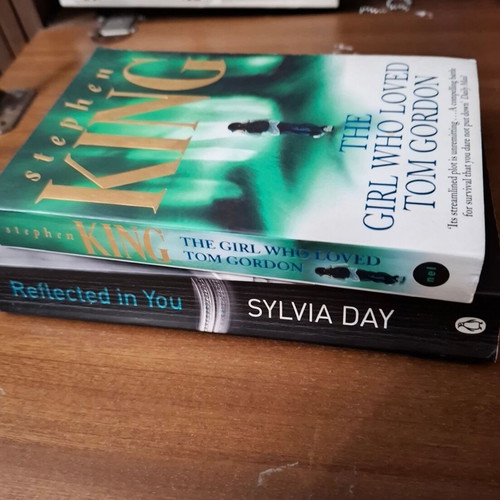 Reflected in You and The Girl Who Loved Tom Gordon books like new, English
