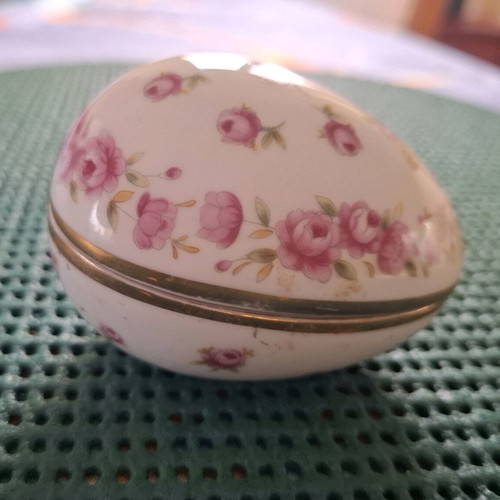 Porcelain decorative container used, small egg with pink flowers