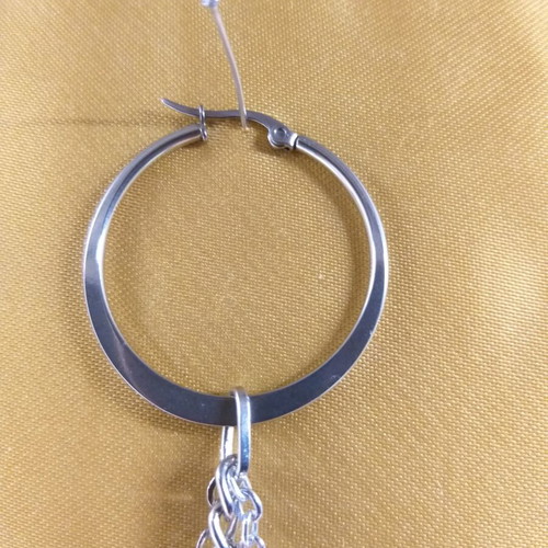 Single earring new with hoop and long chain, of wisdom, peace and love