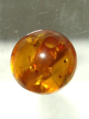 Authentic Baltic amber processed like new, pierced 10.6mm 3.20ct