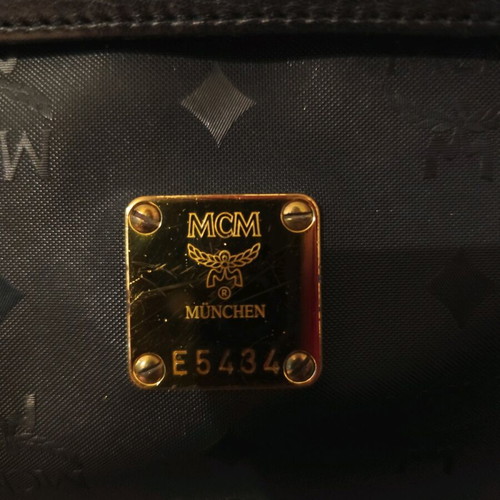 MCM shoulder bag used, black, with multiple compartments