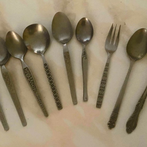 Vintage cutlery set used, 9 pieces with decorative designs