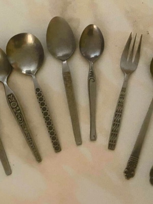 Vintage cutlery set used, 9 pieces with decorative designs
