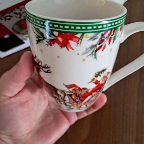 Porcelain Christmas mugs used, set of 2 with boxes
