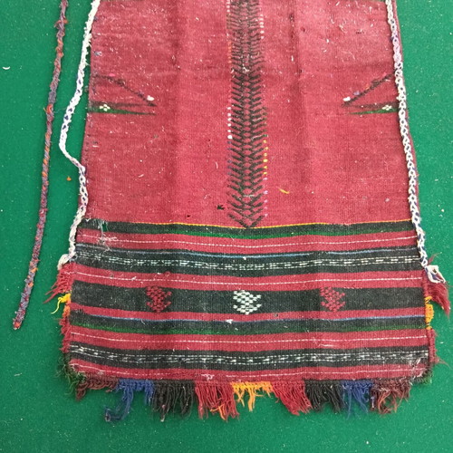 Red striped traditional costume apron used with wear