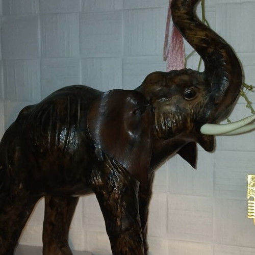 Elephant decorative large used 47x43cm with ear tear