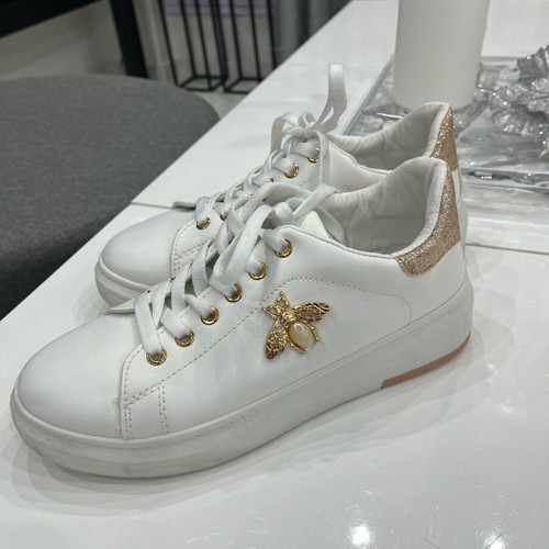 Women's athletic shoes used, white with gold details, size 39