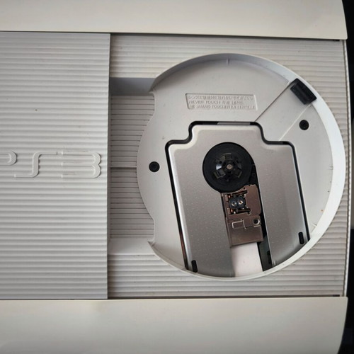 Sony PlayStation 3 Super Slim Classic White 500GB used with DualShock 3