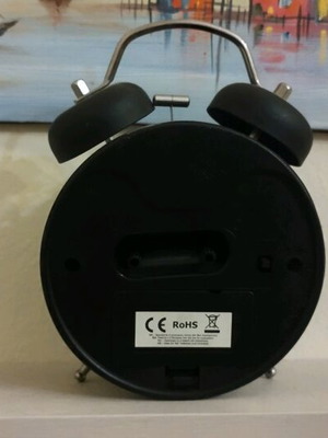 Analog tabletop clock used alarm