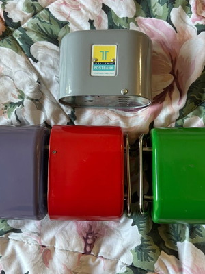 Iron savings piggy banks like new, set of 4, multicolor