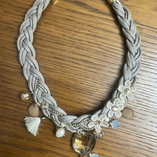 Handmade statement necklace with grey braided cord and fabric flowers