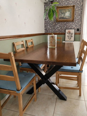 Monastic-style handmade dining table with 6 IKEA chairs and cushions