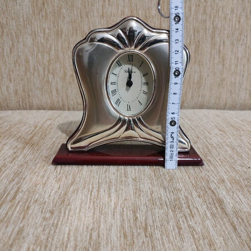 Silver table clock used with rosewood base