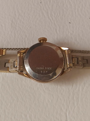 Vintage Swiss Made women's watch, gold plated with safety chain, 20 MC
