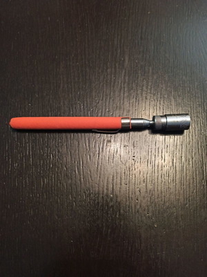 Pen antenna folding with magnet and flashlight used