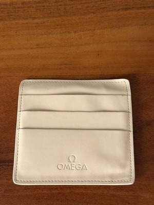 Omega card holder authentic like new, beige travel pouch