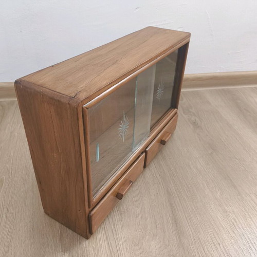 Vintage cabinet restored with engraved glass