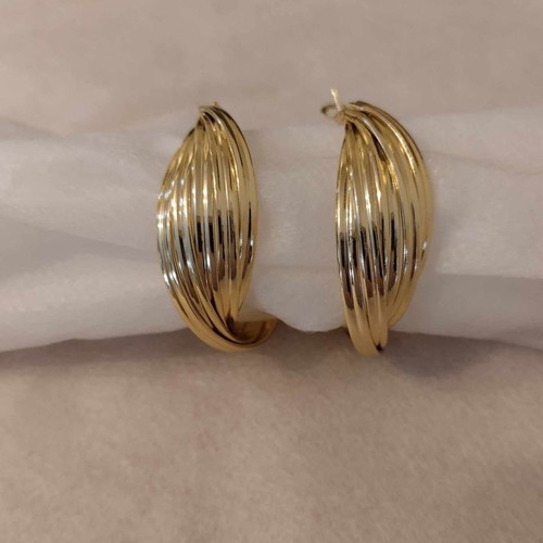 Asymmetric earrings with embossed ridges gold color new