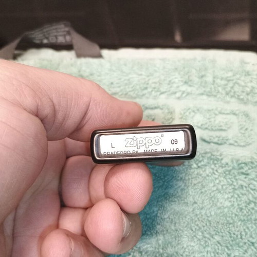 Zippo used collectible lighter with Rae design