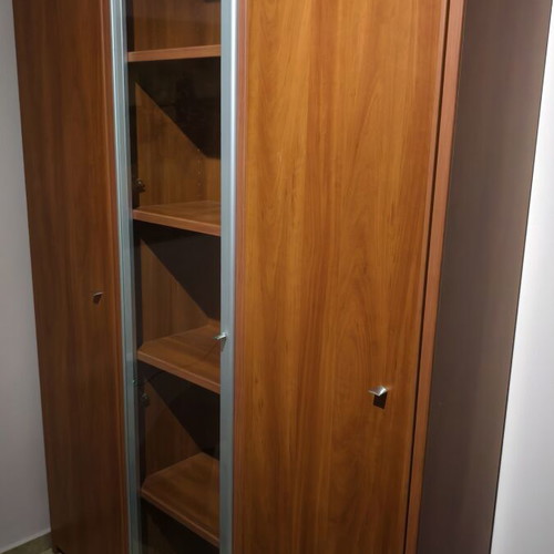 Trifylli bookshelf with two closed cabinets and one glass door