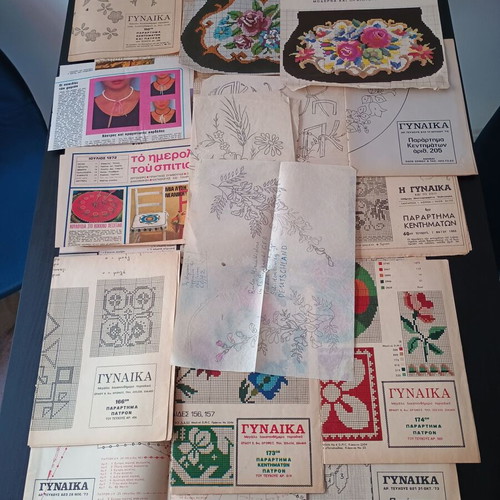 DMC and Burda embroidery patterns used, assorted