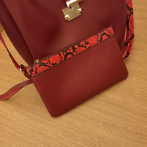 Nora's shoulder bag like new, red with matching pouch
