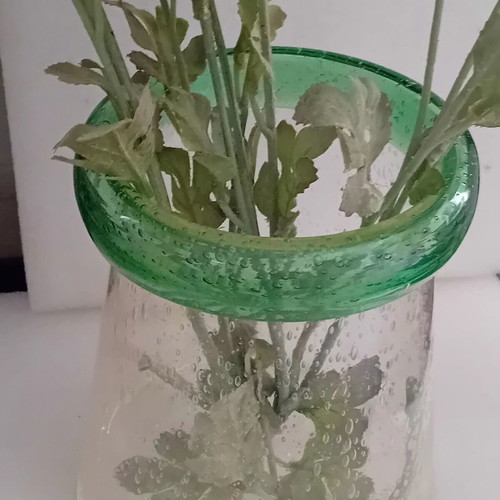 Large glass vase with fabric flowers