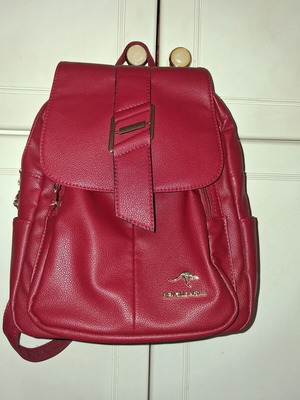 Women's red backpack with gold details
