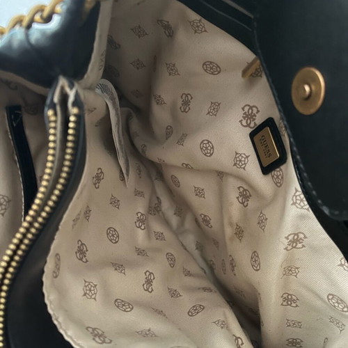 Guess shoulder bag black and gold like new