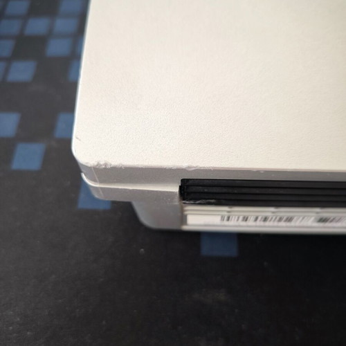 Sony PlayStation 3 Slim Satin Silver 320GB console with original DualShock 3 used