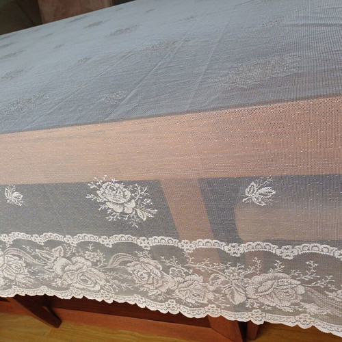 Transparent tablecloth used, light pink with rose patterns