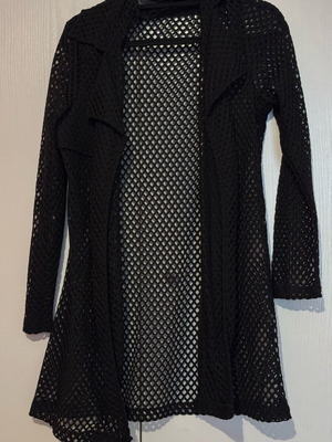 Black jacket one size with transparency like new