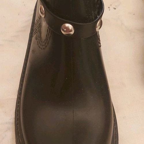 Women's galotses used size 37 durable plastic with cotton lining and removable studded strap