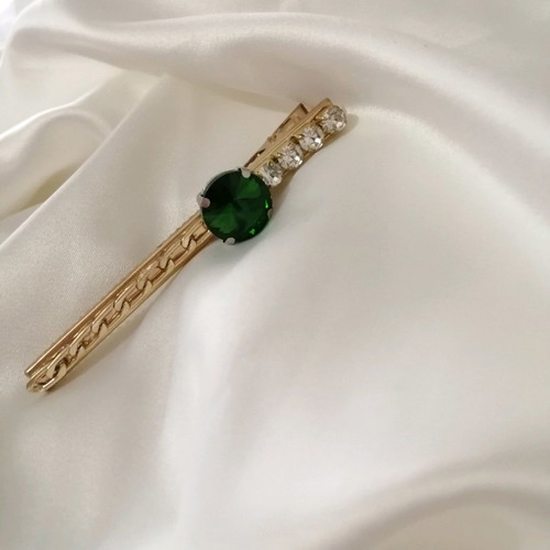 Hair clip new gold color with silver rhinestones and green gem
