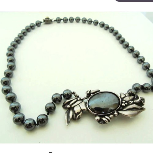 Vintage necklace with hematite beads and motif-pin used, gray