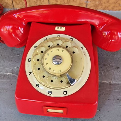 Vintage telephone from 1970s like new, red, wired