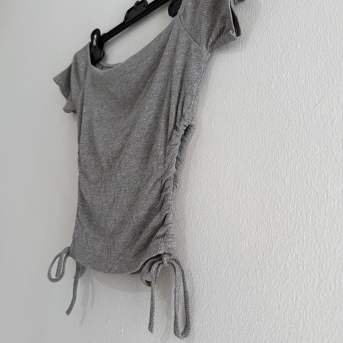 Women's gray blouse with short sleeves and drawstrings used, size S