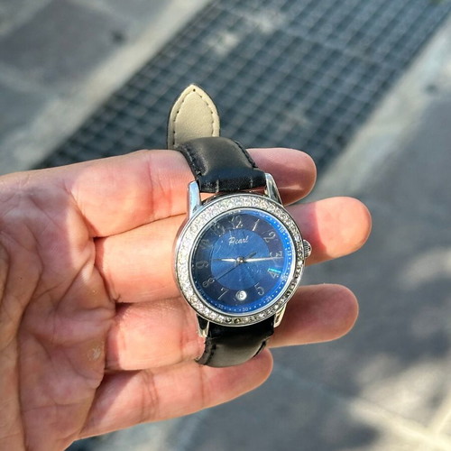 Vintage Pearl wristwatch with blue dial and stones