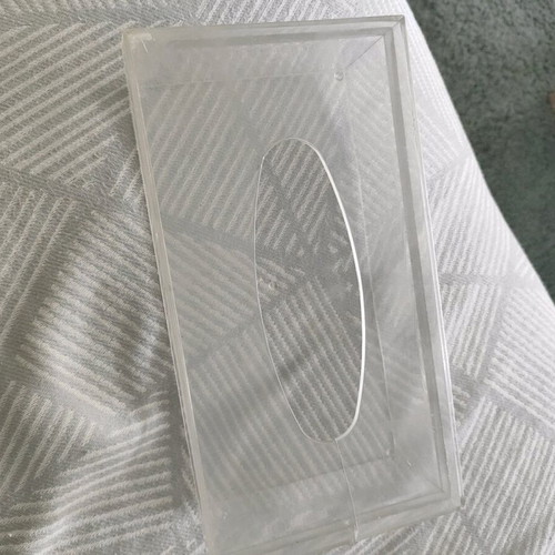 Plastic tissue box used, slightly cracked