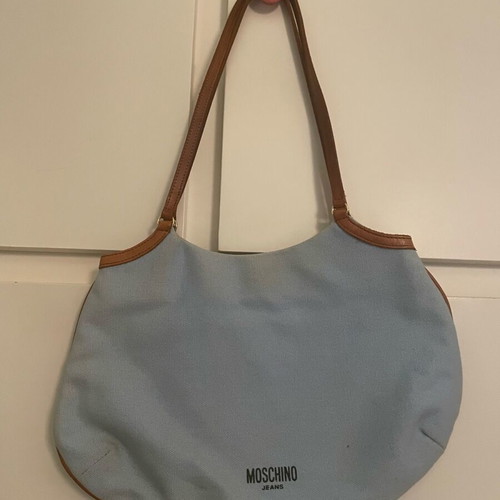 Moschino shoulder bag and denim pouch used, cotton and leather